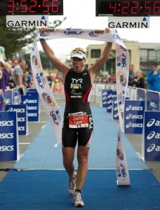 Jo Lawn crossing the finish line