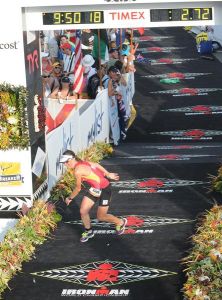 Hilary Wicks celebrates after winning the 35-39 age group in Kona