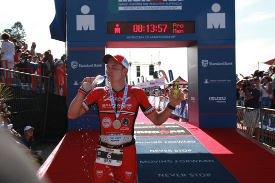 Ben Hoffman celebrates his Ironman South Africa win