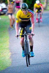 Cameron Dye climbing One Tree Hill on his TT bike