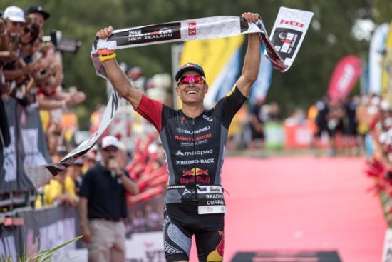 Braden Currie winning Ironman NZ in March